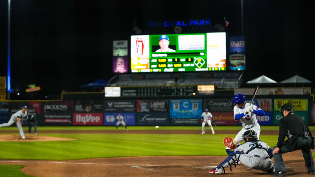 Iowa Cubs first baseman Matt Mervis (41) watches the pitch come towards the plate during the season opener at Principal Park in Des Moines on Friday, March 31, 2023. The Cubs defeated the Clippers, 11-5.